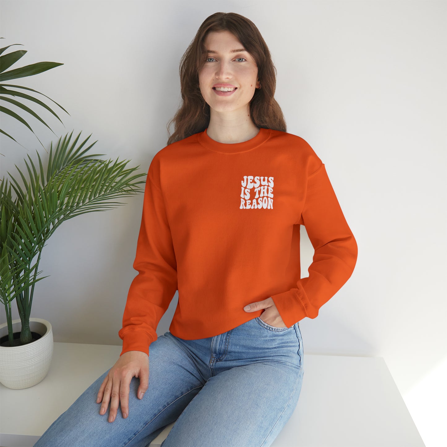 Jesus is the Reason Front & Back Design White Logo Unisex Heavy Blend™ Crewneck Sweatshirt