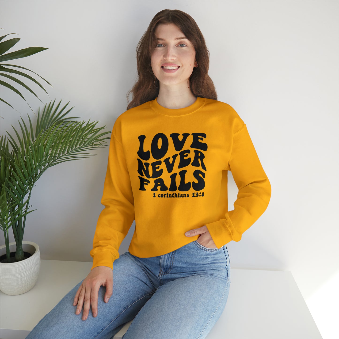 Love Never Fails Black Logo Unisex Heavy Blend™ Crewneck Sweatshirt