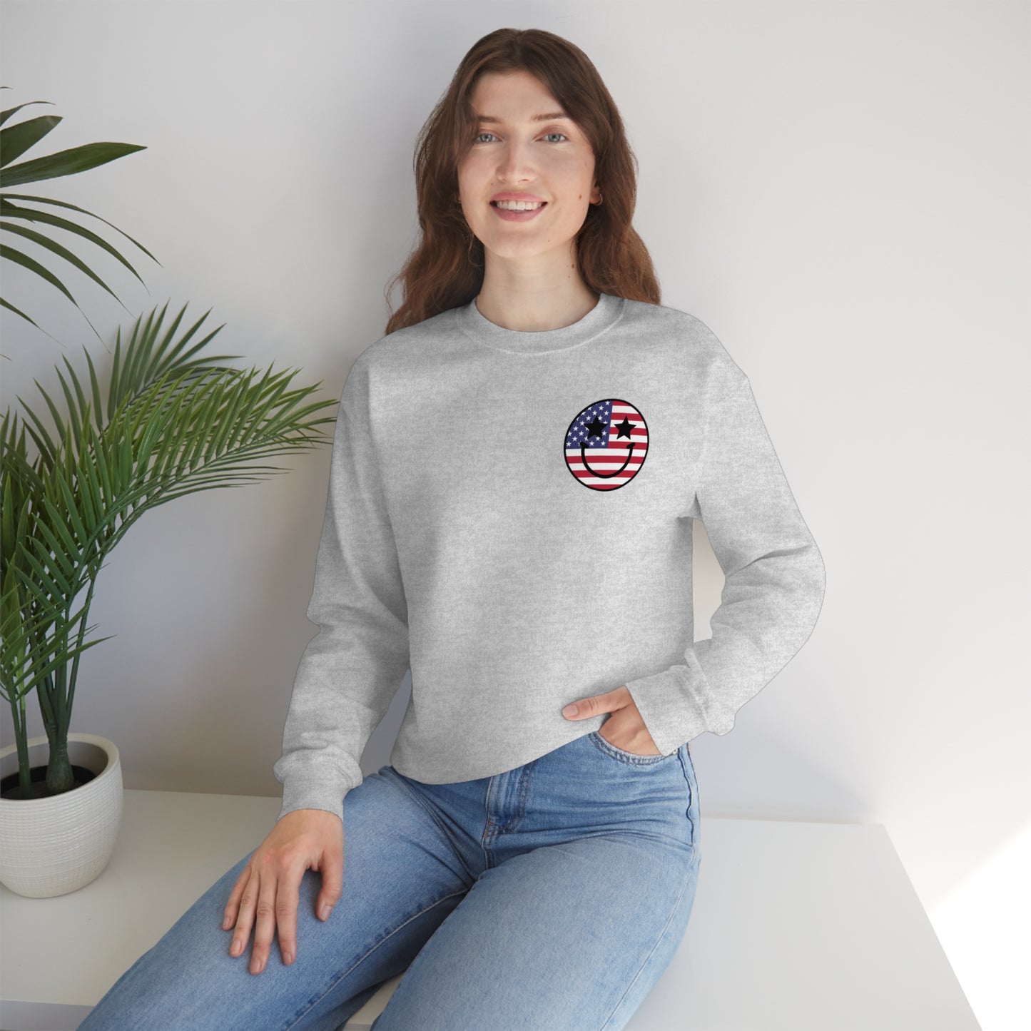 "Land of the Free Because of the Brave with Smiley Face Front" (Front & Back Design) - Unisex Heavy Blend™ Crewneck Sweatshirt