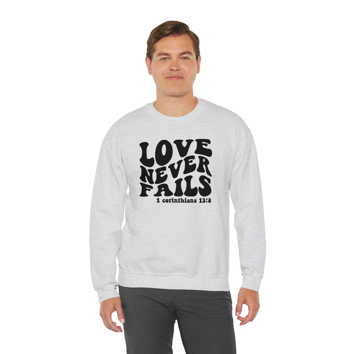 Love Never Fails Black Logo Unisex Heavy Blend™ Crewneck Sweatshirt