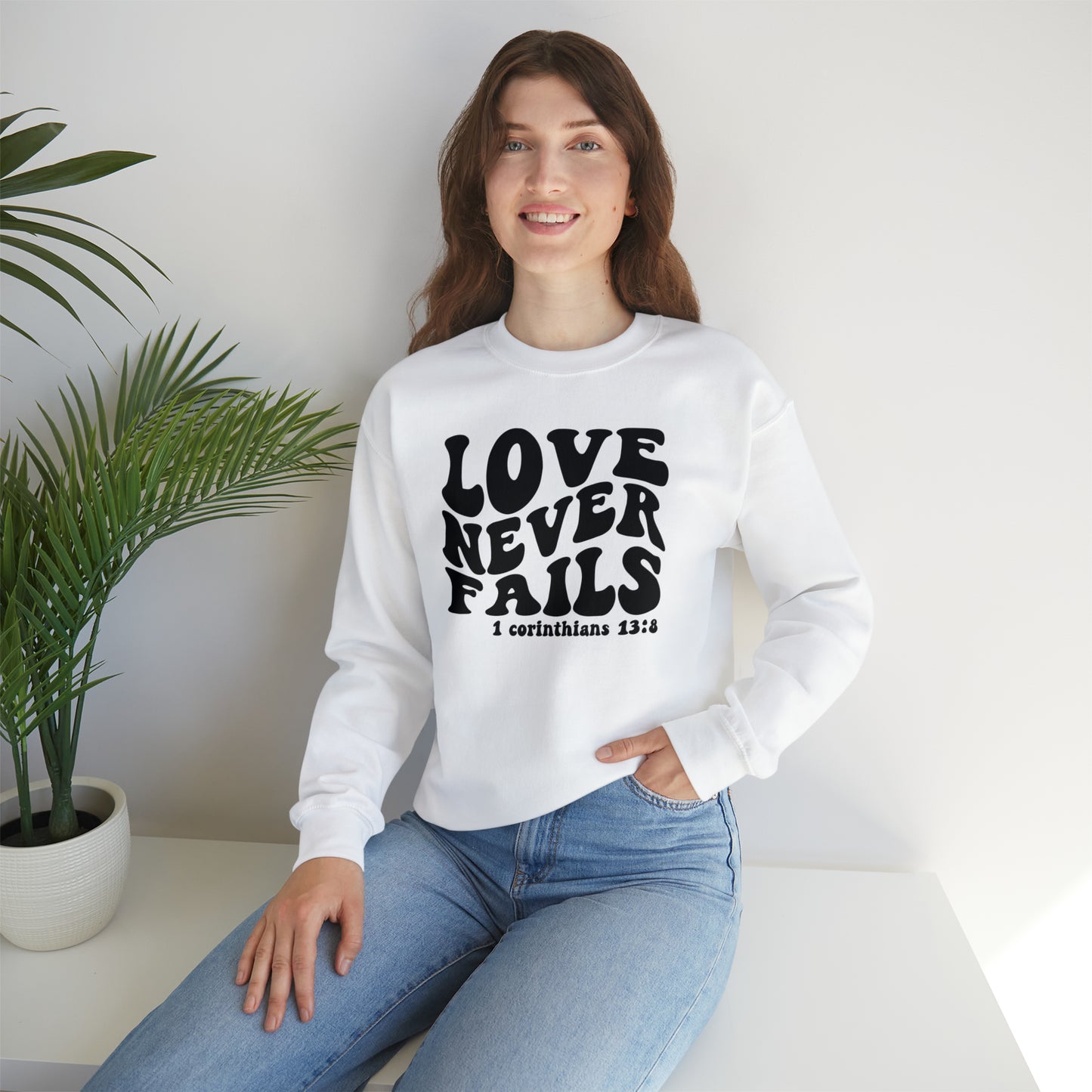 Love Never Fails Black Logo Unisex Heavy Blend™ Crewneck Sweatshirt