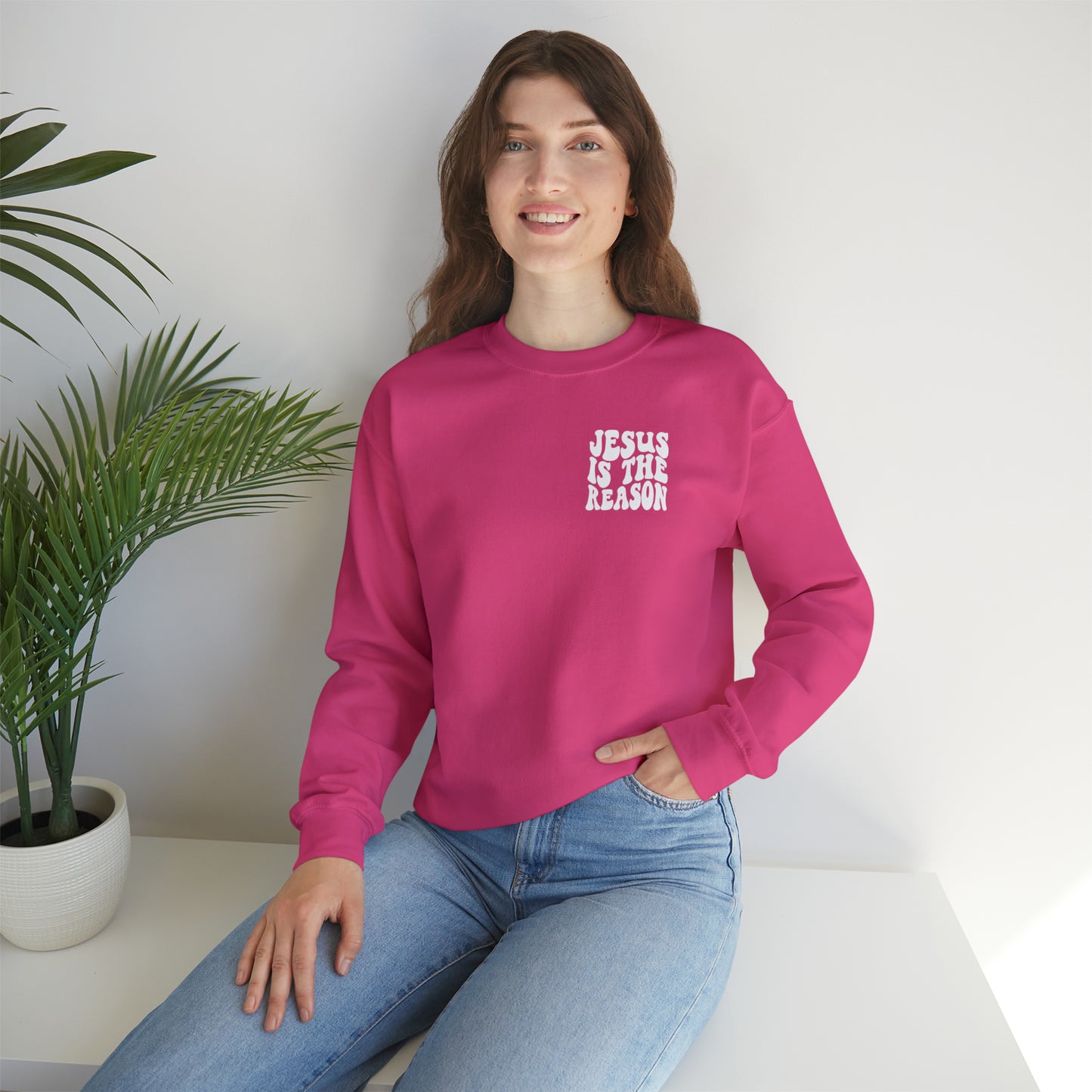 Jesus is the Reason Front & Back Design White Logo Unisex Heavy Blend™ Crewneck Sweatshirt