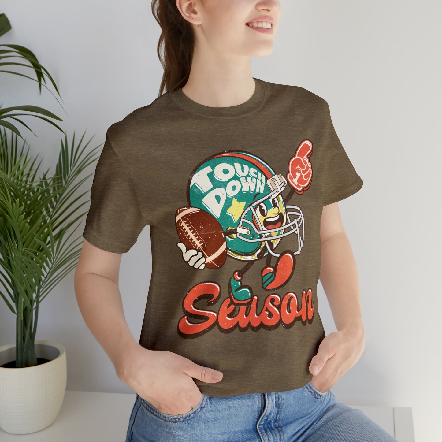 Football Season Football Helmet Character Holding Football T-Shirt