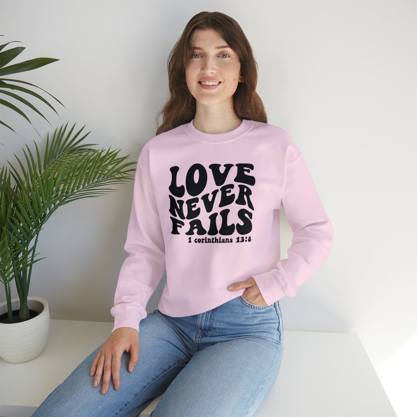 Love Never Fails Black Logo Unisex Heavy Blend™ Crewneck Sweatshirt