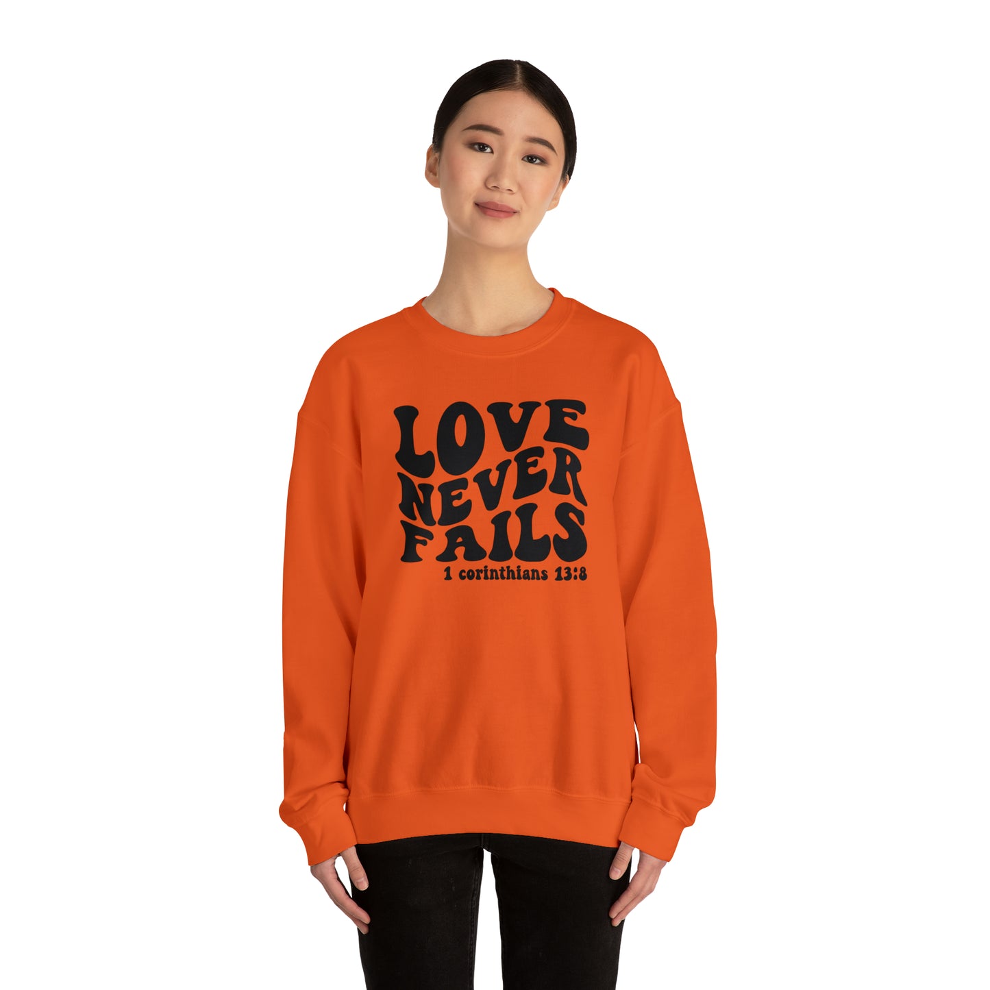 Love Never Fails Black Logo Unisex Heavy Blend™ Crewneck Sweatshirt