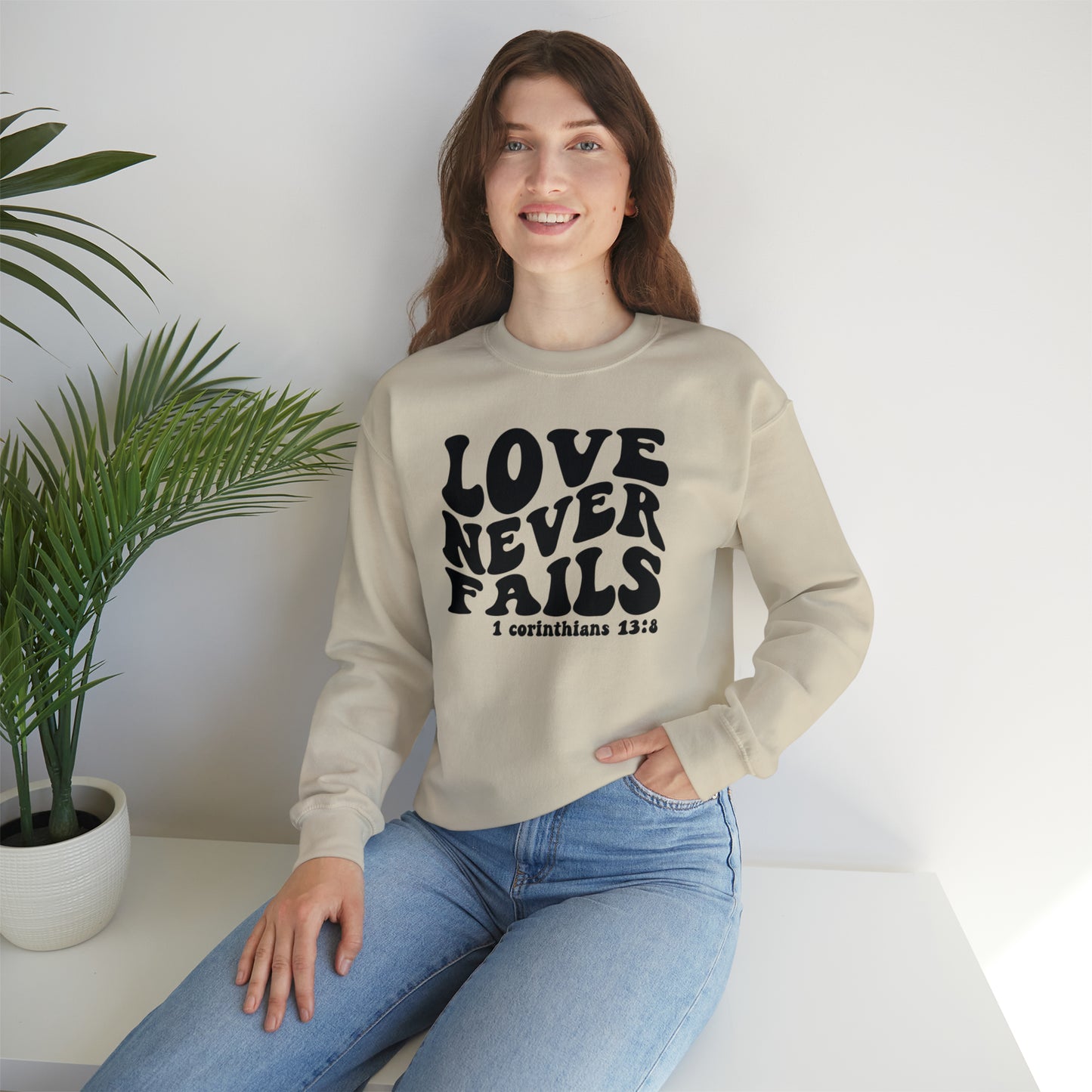 Love Never Fails Black Logo Unisex Heavy Blend™ Crewneck Sweatshirt