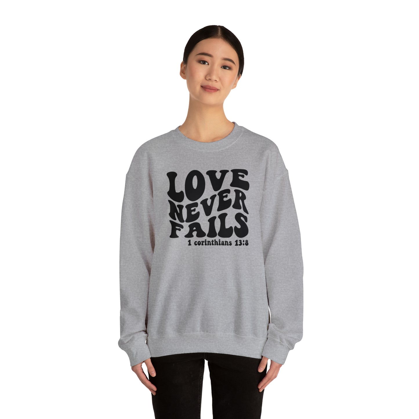 Love Never Fails Black Logo Unisex Heavy Blend™ Crewneck Sweatshirt