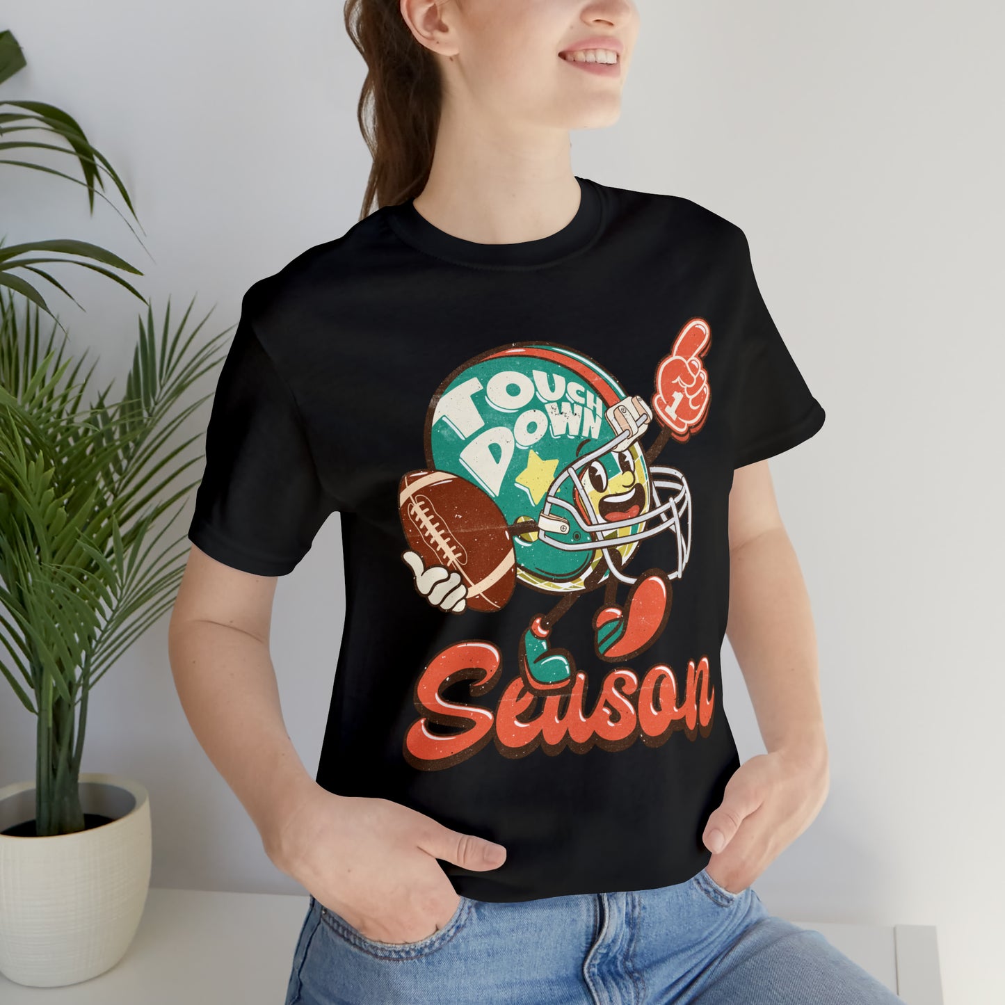 Football Season Football Helmet Character Holding Football T-Shirt