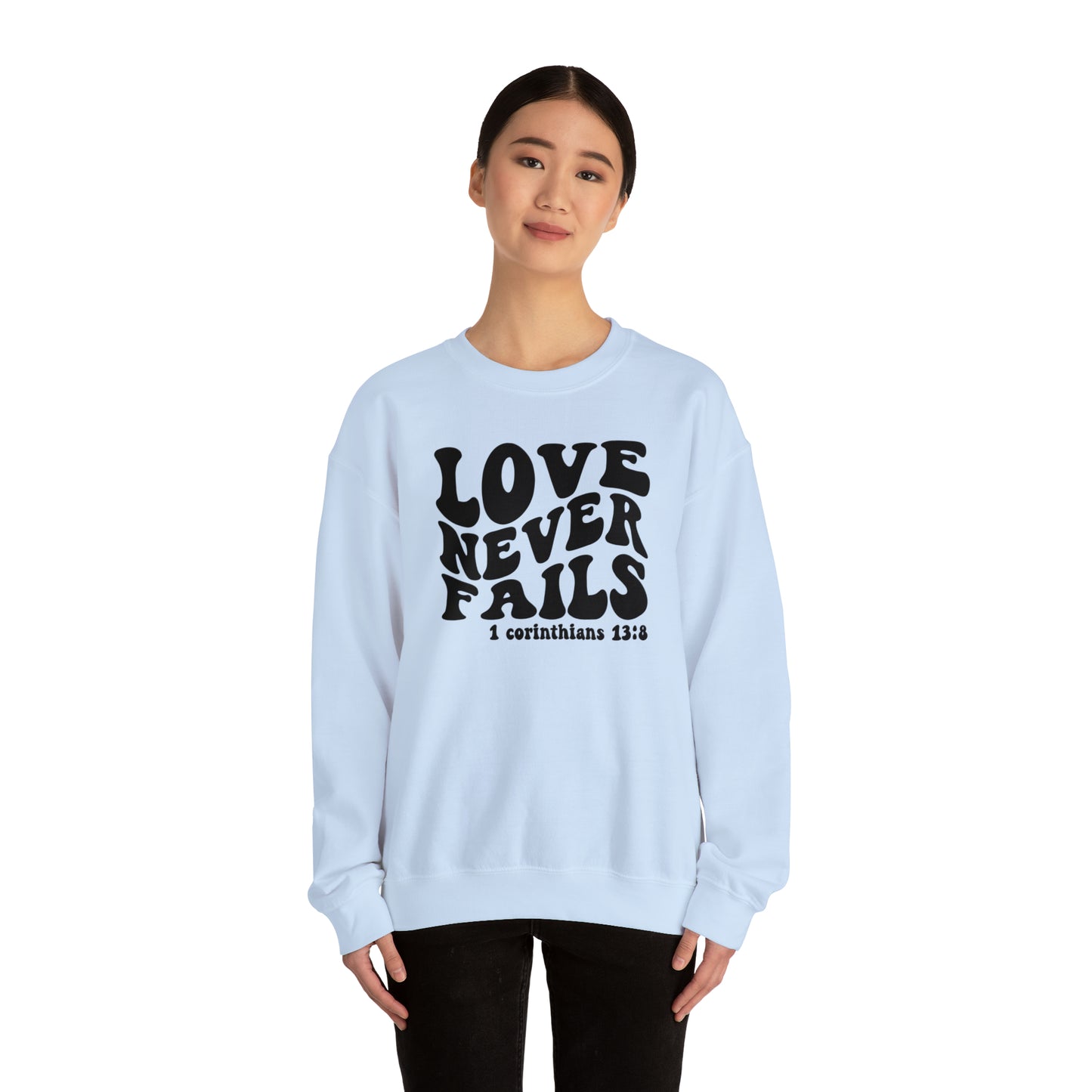 Love Never Fails Black Logo Unisex Heavy Blend™ Crewneck Sweatshirt