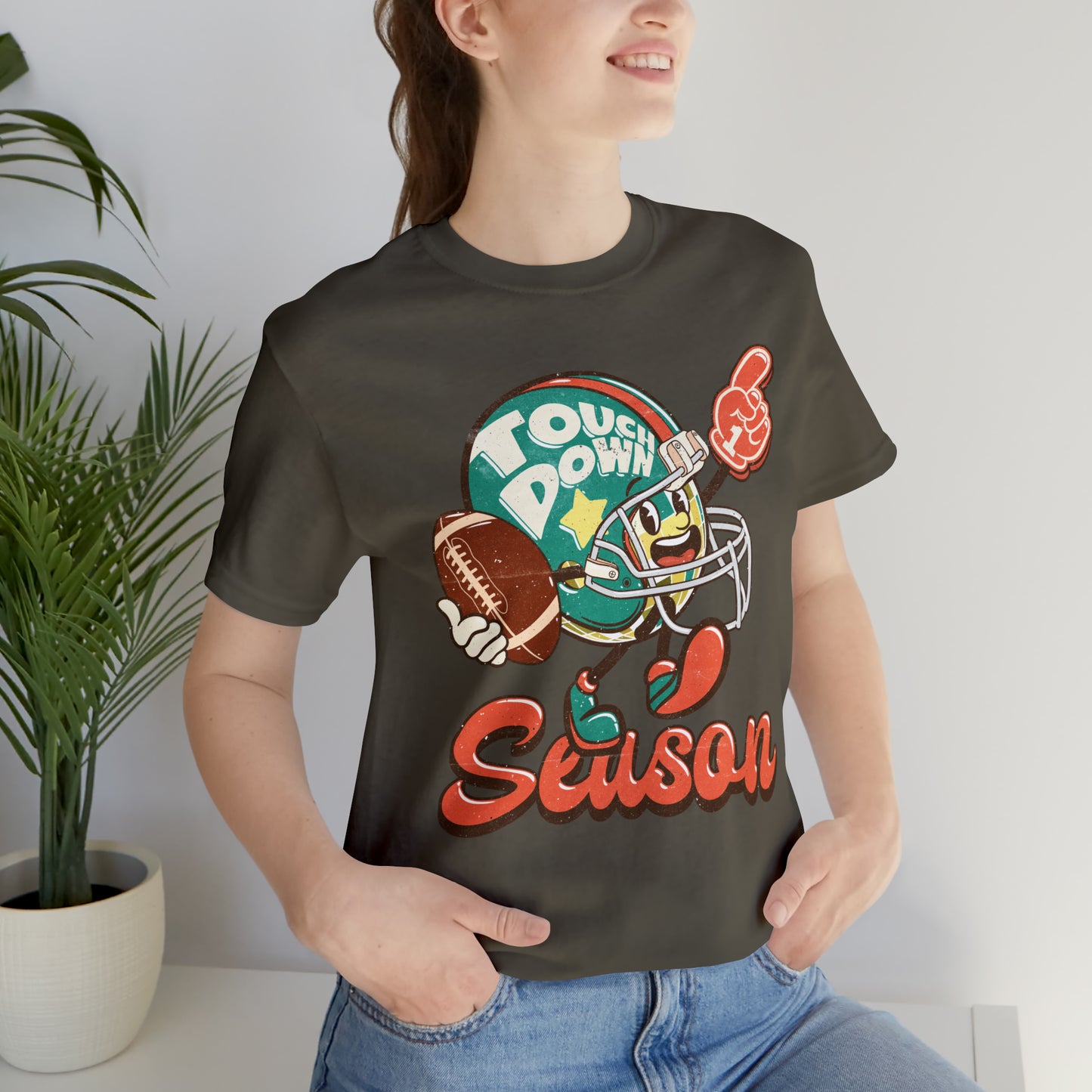 Football Season Football Helmet Character Holding Football T-Shirt