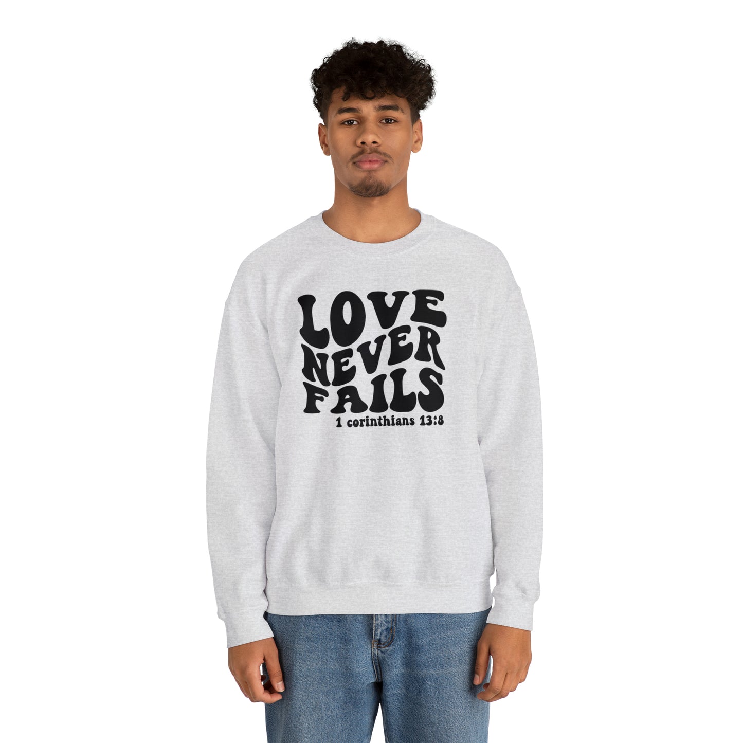 Love Never Fails Black Logo Unisex Heavy Blend™ Crewneck Sweatshirt