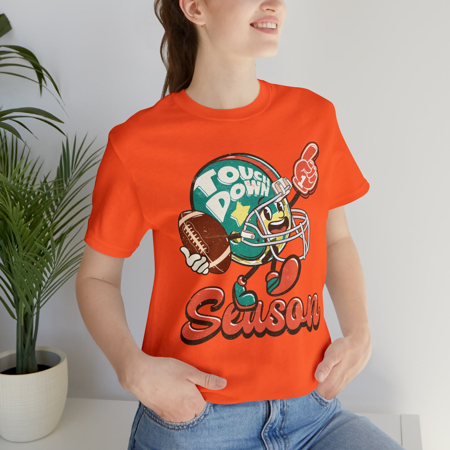 Football Season Football Helmet Character Holding Football T-Shirt