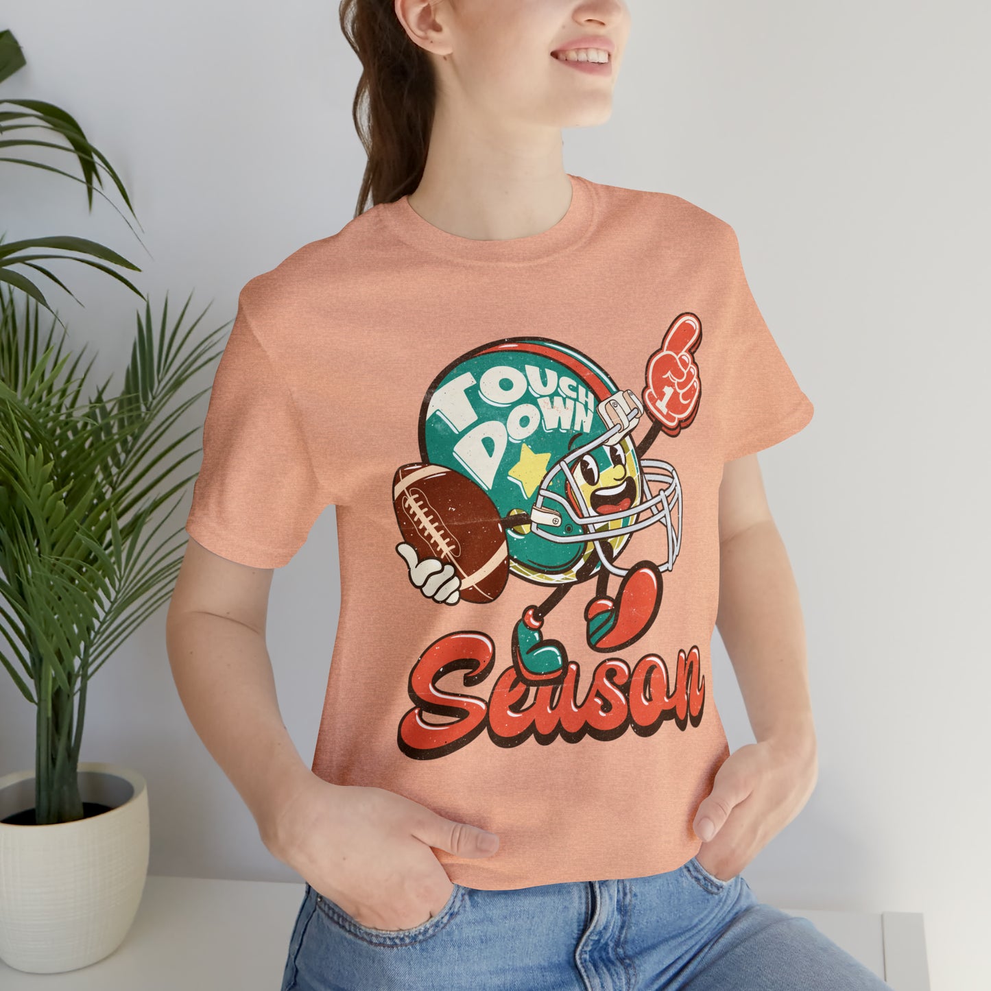 Football Season Football Helmet Character Holding Football T-Shirt