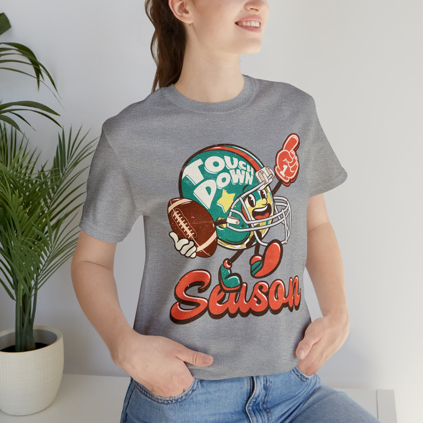 Football Season Football Helmet Character Holding Football T-Shirt