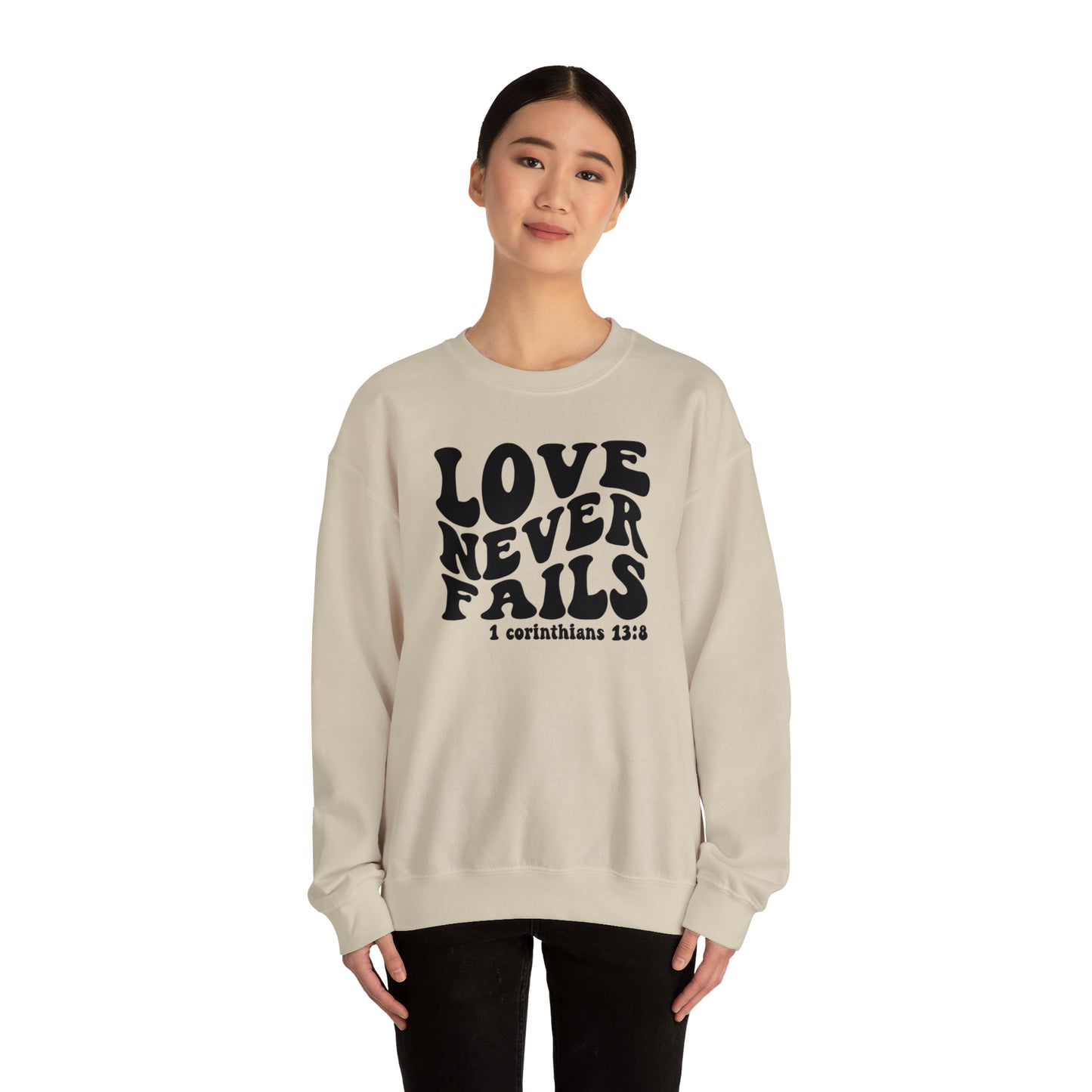 Love Never Fails Black Logo Unisex Heavy Blend™ Crewneck Sweatshirt