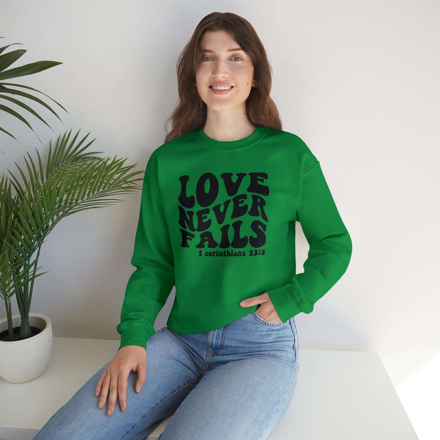 Love Never Fails Black Logo Unisex Heavy Blend™ Crewneck Sweatshirt