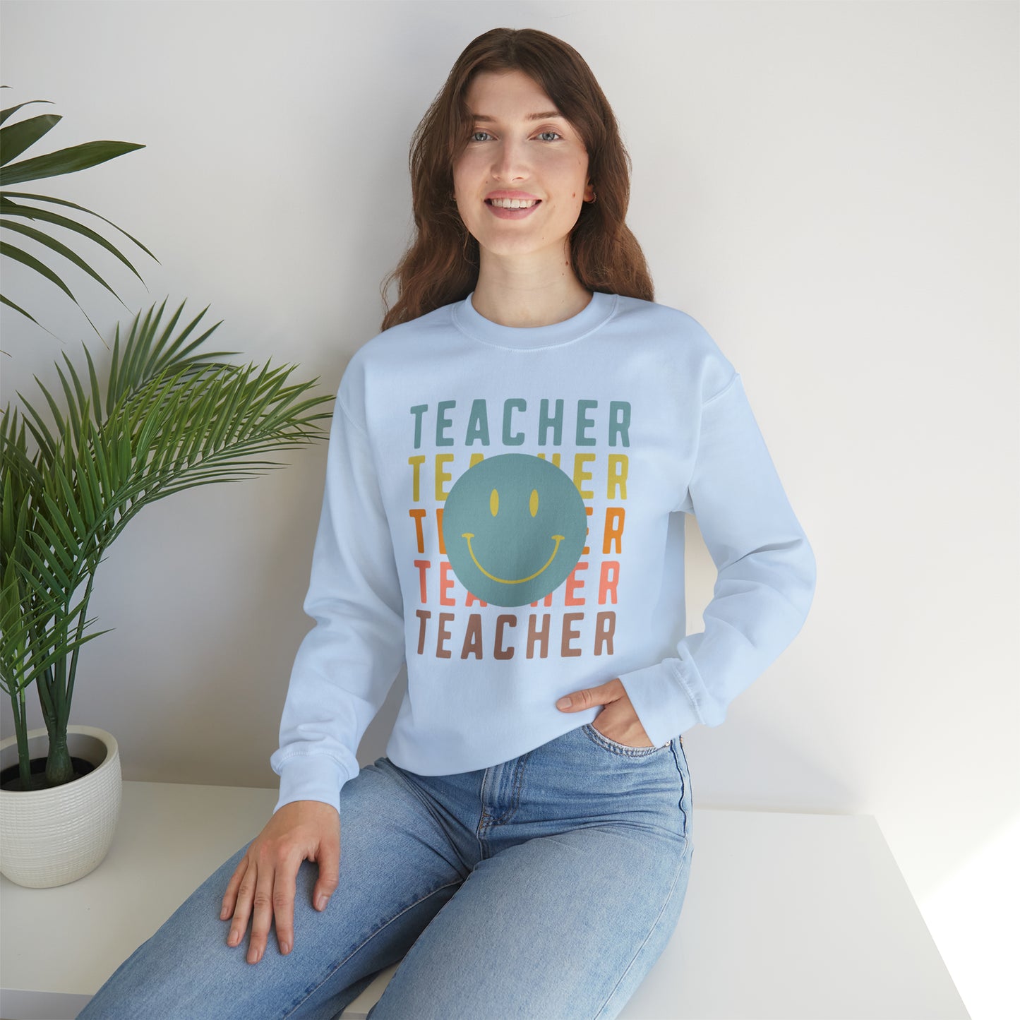 Multi Colored Teacher with Smiley Face Unisex Heavy Blend™ Crewneck Sweatshirt