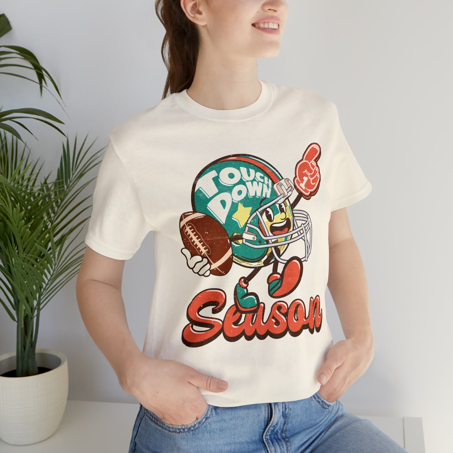 Football Season Football Helmet Character Holding Football T-Shirt