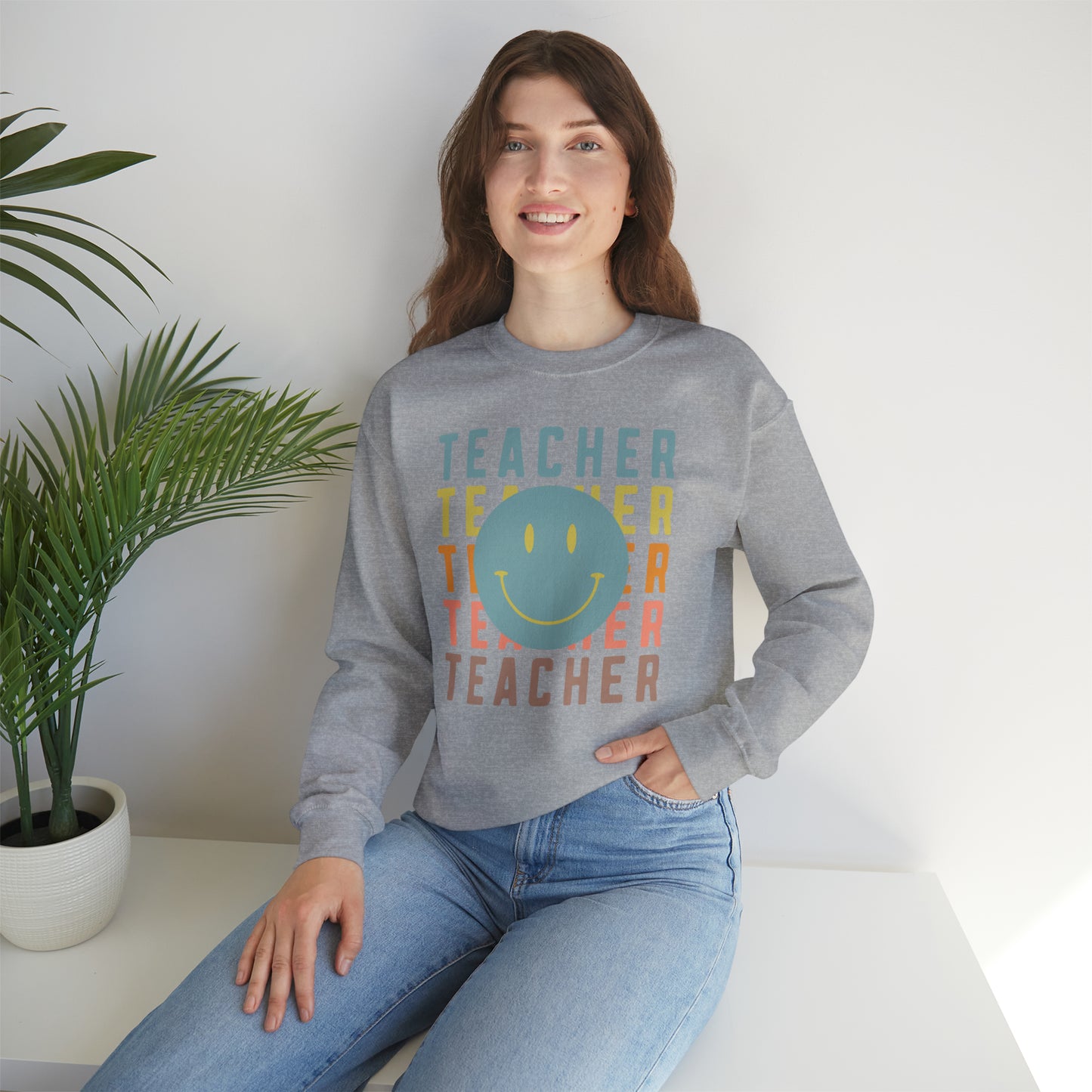 Multi Colored Teacher with Smiley Face Unisex Heavy Blend™ Crewneck Sweatshirt